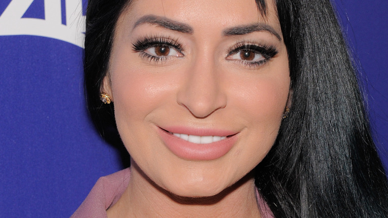 Angelina Pivarnick smiles on the red carpet