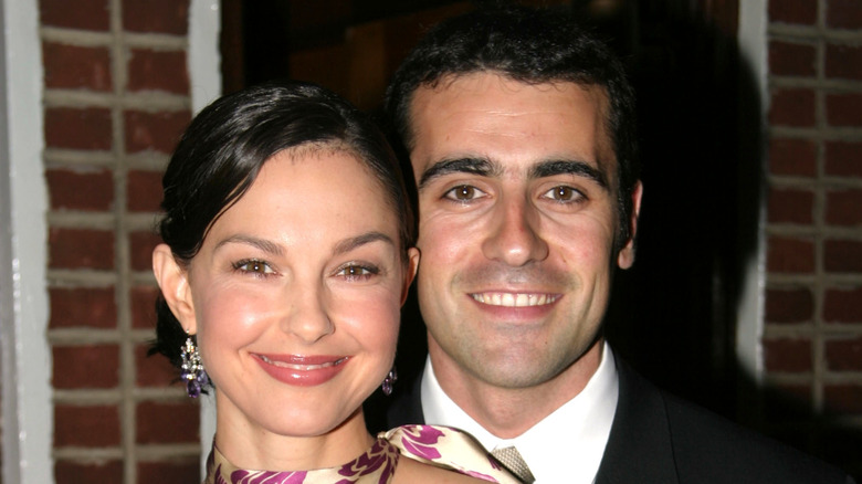 Ashley Judd and Dario Franchitti smiling in close-up