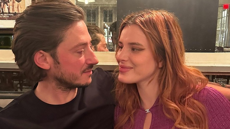 Mark Emms and Bella Thorne making eye contact