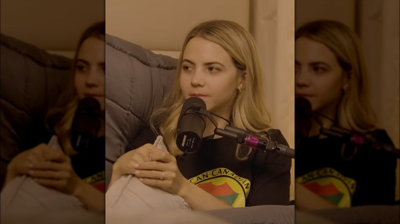 Bobbi Althoff speaking into microphone