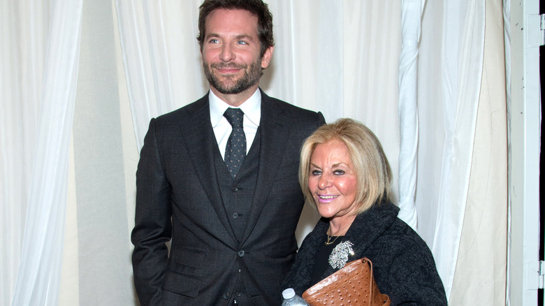 Bradley Cooper and Gloria Campano pose 