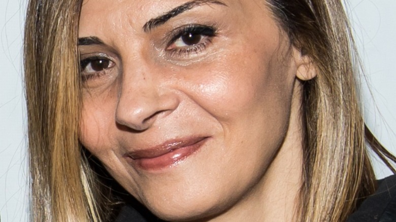 Callie Thorne smirking at NBC Universal All-Star Winter TCA Party 2012