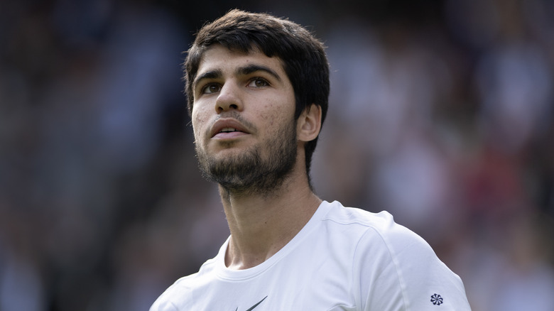 Carlos Alcaraz white T-shirt beard