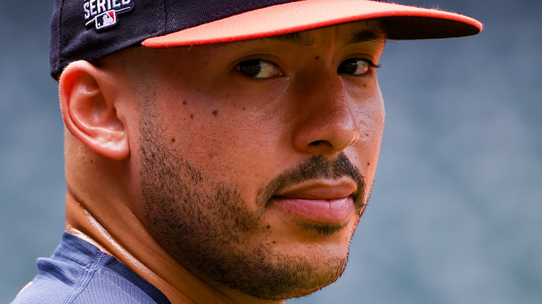 Carlos Correa wearing baseball cap