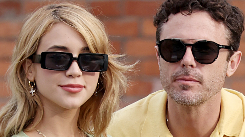 Caylee Cowan and Casey Affleck wearing sunglasses