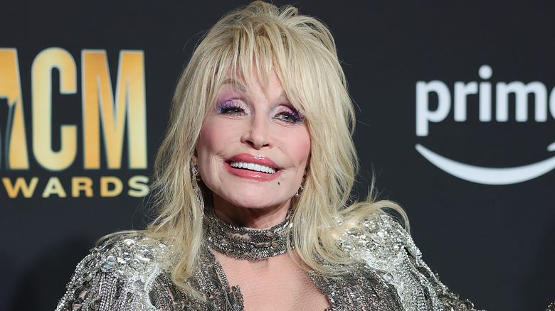 Dolly Parton smiles at event