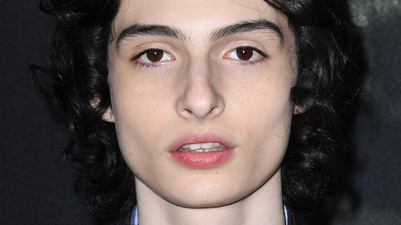 Finn Wolfhard posing