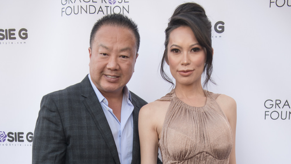 Dr. Gabriel Chiu and Christine Chiu smiling on the red carpet