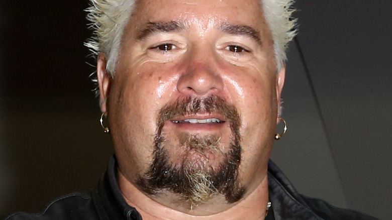 Guy Fieri smiling at the camera