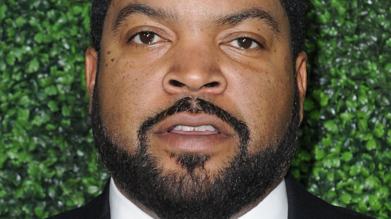 Ice Cube poses in a tux
