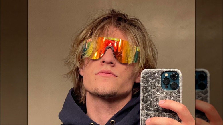 Jake Bongiovi posing for selfie in sunglasses