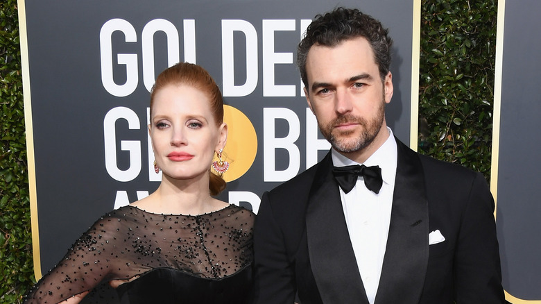 Jessica Chastain and Gian Luca Passi de Preposulo pose at the Golden Globes