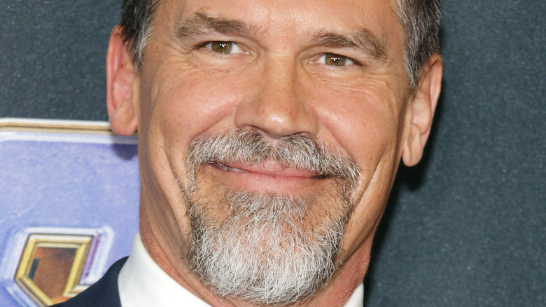 Josh Brolin smiles on the red carpet