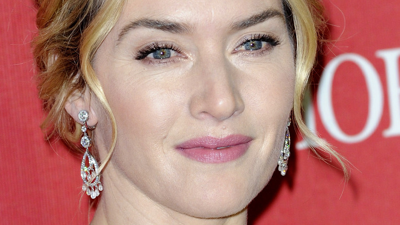 Kate Winslet poses in drop earrings