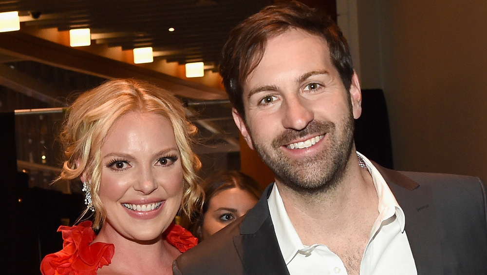 Katherine Heigl and Josh Kelley smiling at an event