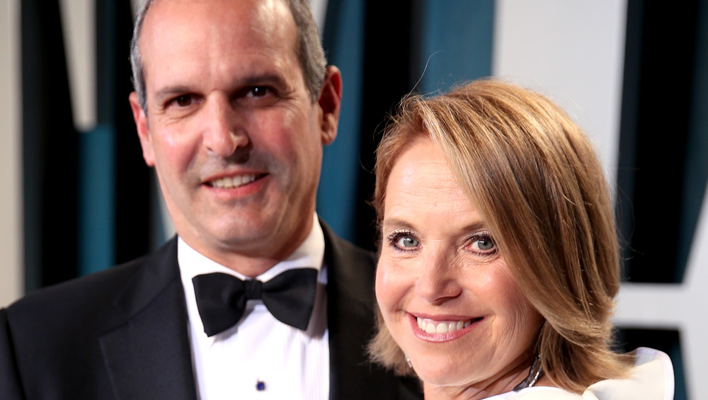 Katie Couric and John Molner smiling