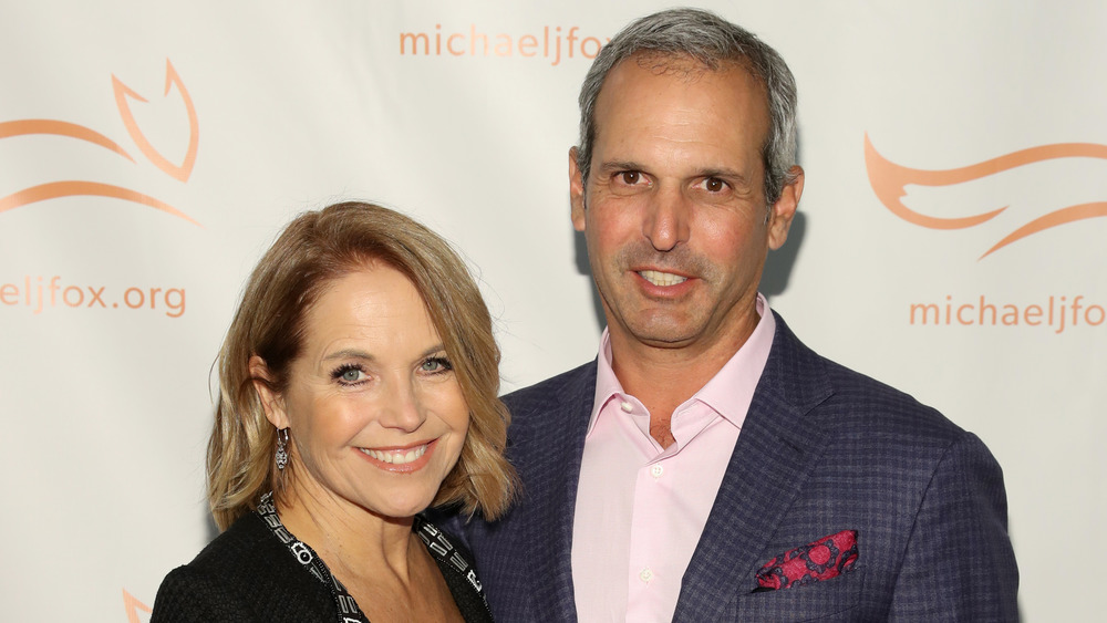 Katie Couric and John Molner smiling