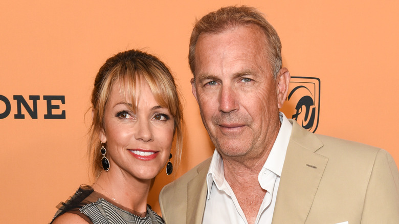Christine Baumgartner and Kevin Costner on the red carpet