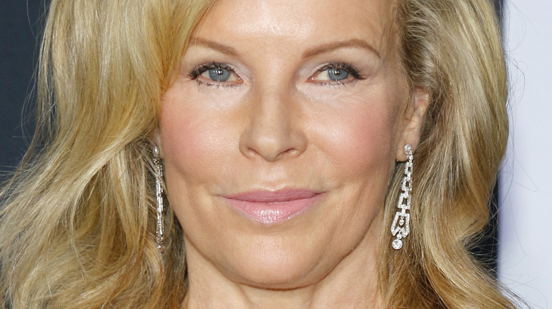 kim basinger silver earrings