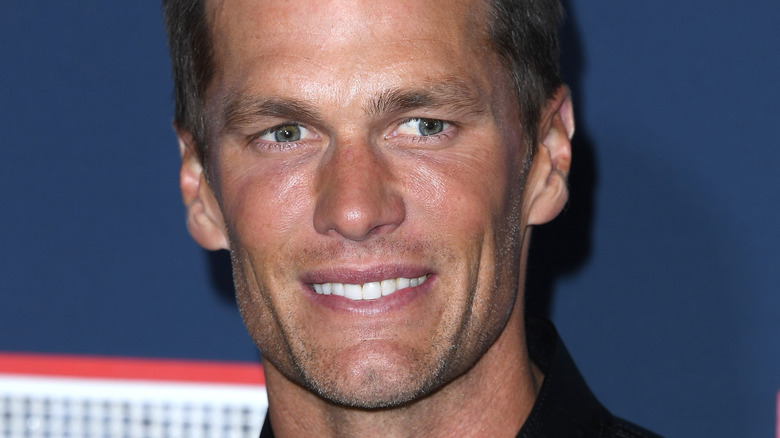 Tom Brady smiling in 2023