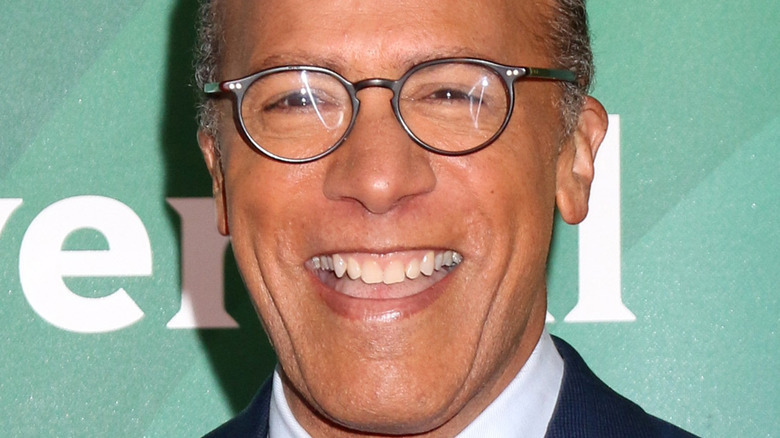 Lester Holt laughs on the red carpet