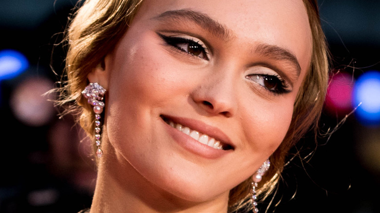 Lily-Rose Depp smiles on the red carpet