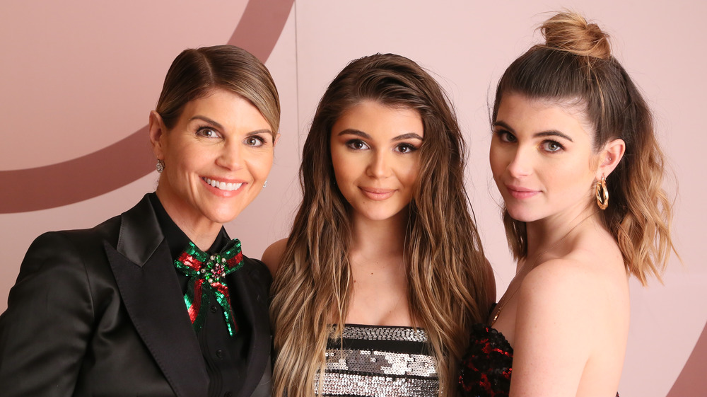 Lori Loughlin, Olivia Jade Giannulli, and Bella Giannulli at an event