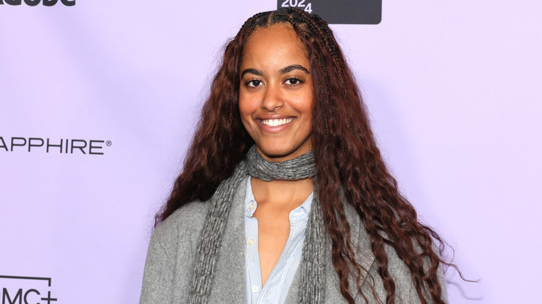 Malia Obama smiling with teeth