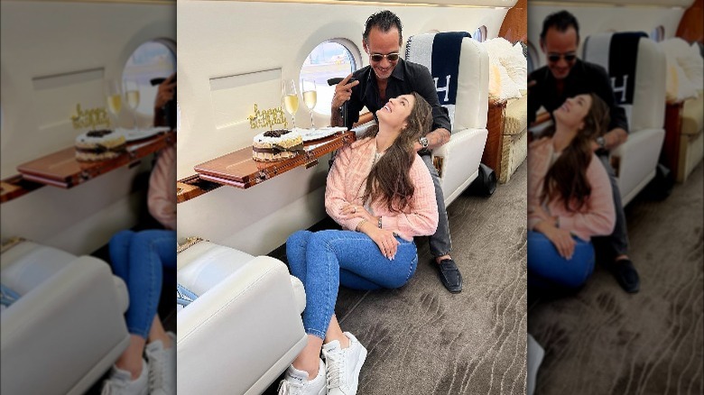 Nadia Ferreira on a private jet with Marc Anthony