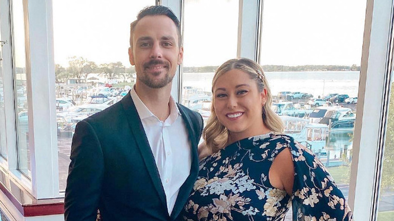 Matt Moeller and Alaina Scott smile at an event