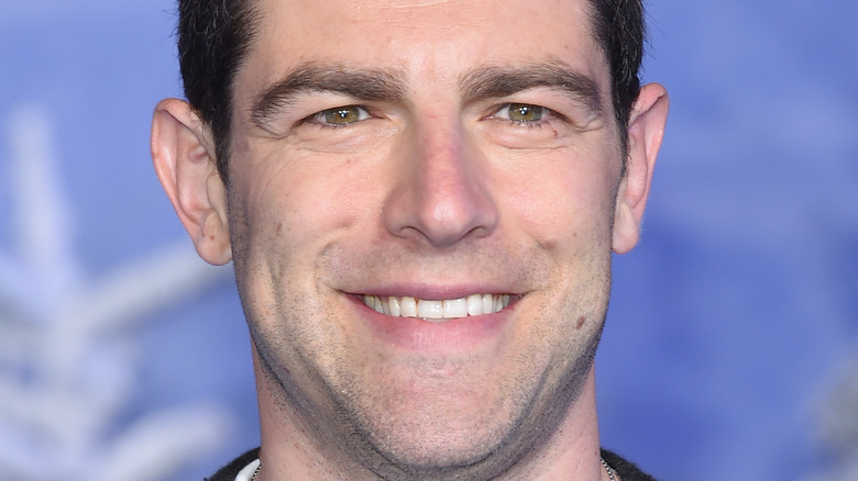 Max Greenfield smiling