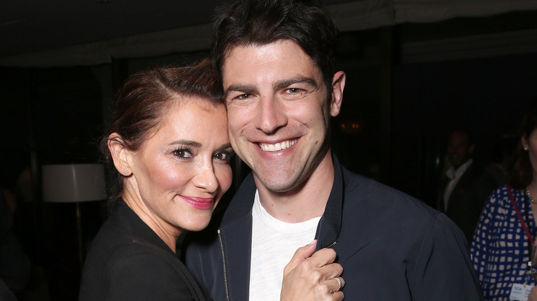 Max Greenfield and Tess Sanchez posing