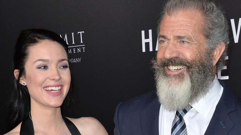 Mel Gibson and Rosalind Ross on a red carpet