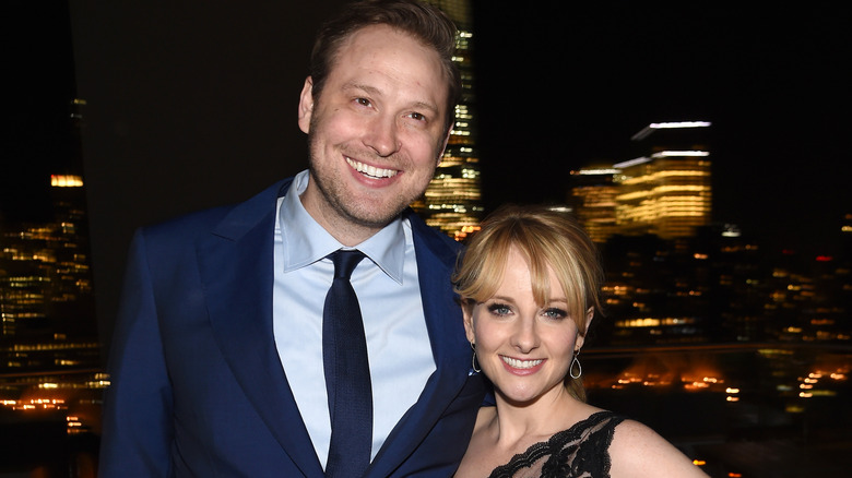 Winston and Melissa Rauch pose together 
