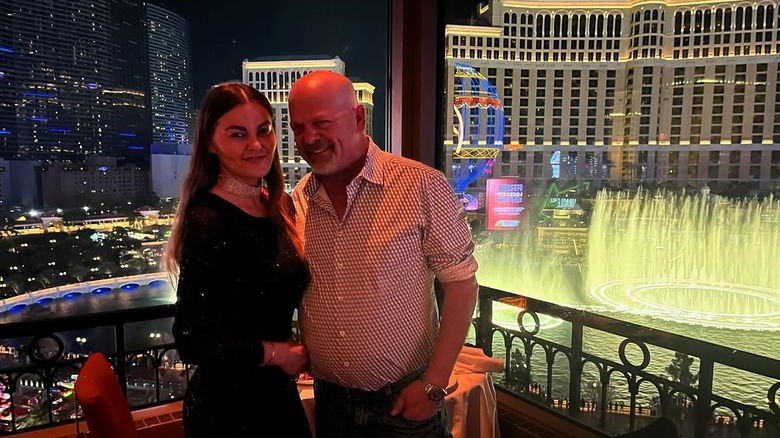  Angie Polushkin, Rick Harrison posing on Vegas balcony