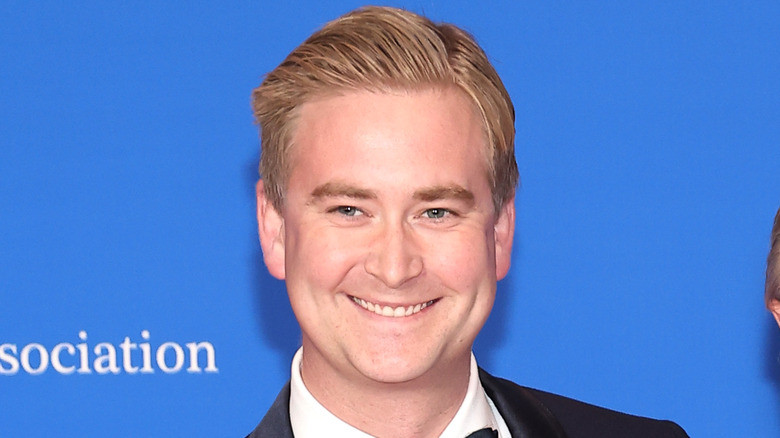 Peter Doocy smiling