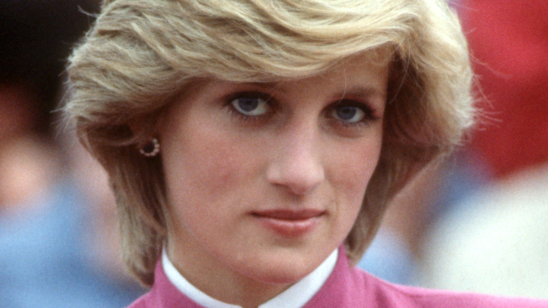 Princess Diana wearing pink coat