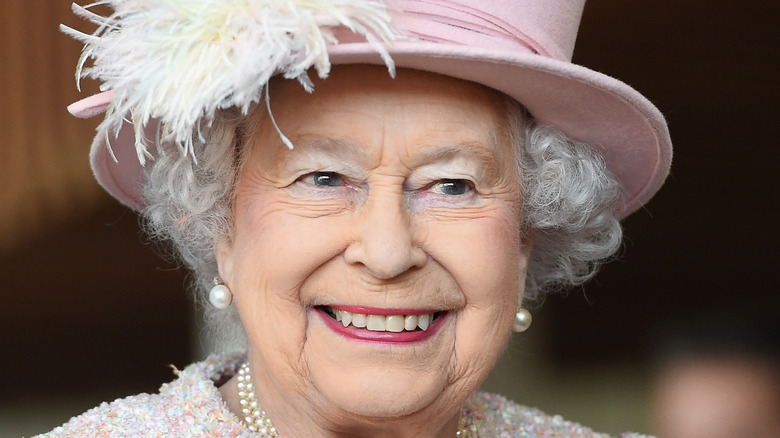 Queen smiling