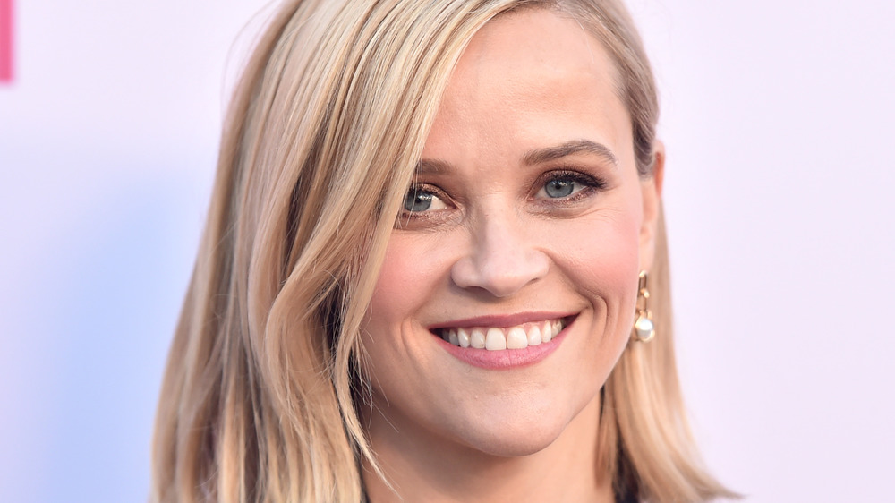 Reese Witherspoon smiles on the red carpet