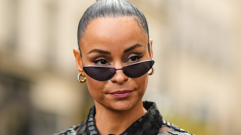 Sai De Silva wearing sunglasses