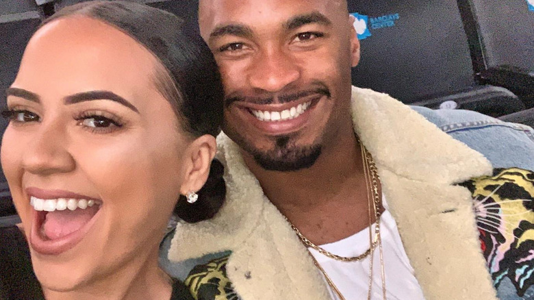 Alexandra and Robert Woods in stands 
