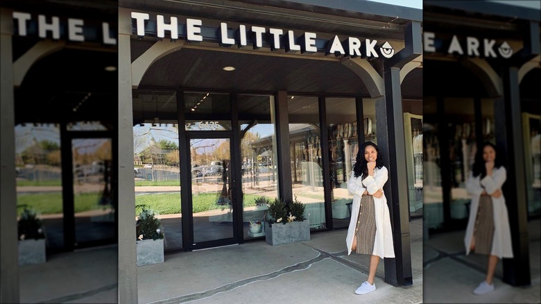Nina Westbrook posing in front of The Little Ark