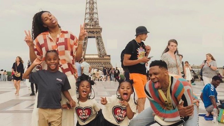Russell and Nina Westbrook and their children posing