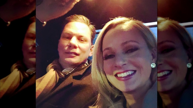 John Conolly and Sandra Smith posing for a car selfie