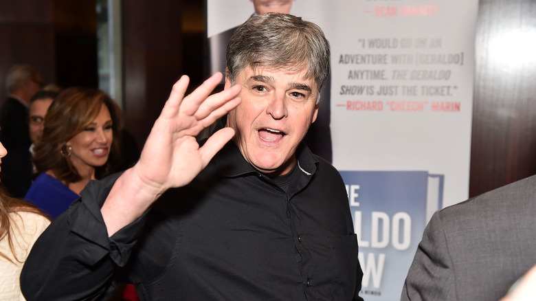 Sean Hannity waving