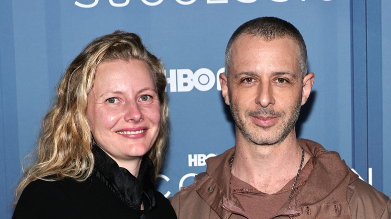 Jeremy Strong posing with wife Emma Wall