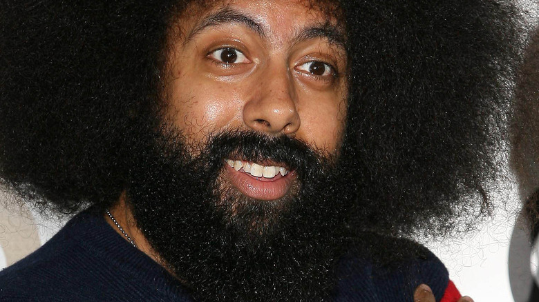 Reggie Watts smiling red carpet