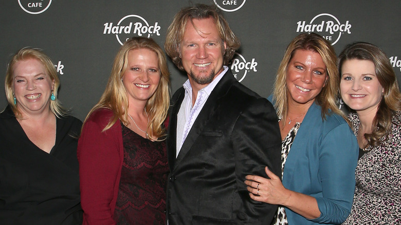 Kody Brown and the Sister Wives smiling