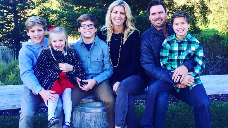 Joshua Morrow poses with his family