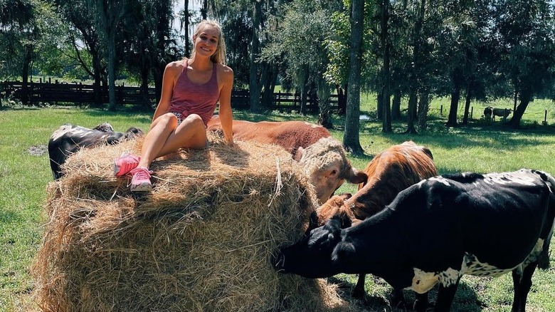 Meghan Dressel sitting on hay bale